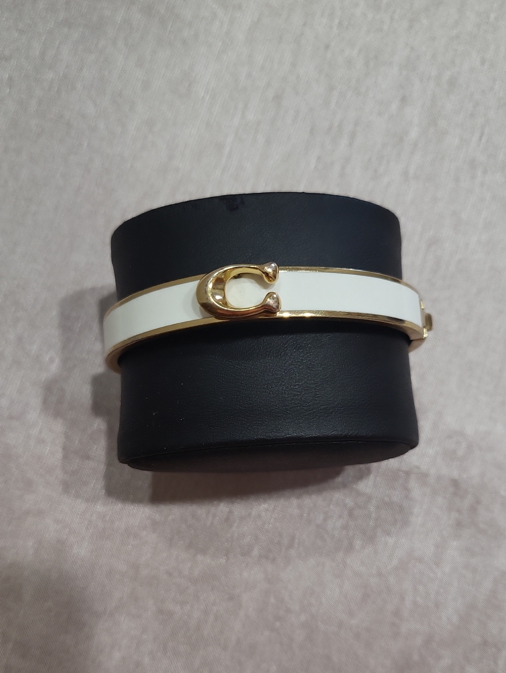 Coach White Enamel Bangle Bracelet with Gold 'C' Accent